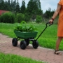 Picture of Folding car Poly Garden dump truck with steel frame, 10 inches. Pneumatic tire, 300 lb capacity body 55L Green