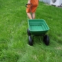 Picture of Folding car Poly Garden dump truck with steel frame, 10 inches. Pneumatic tire, 300 lb capacity body 55L Green