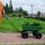 Picture of Folding car Poly Garden dump truck with steel frame, 10 inches. Pneumatic tire, 300 lb capacity body 55L Green